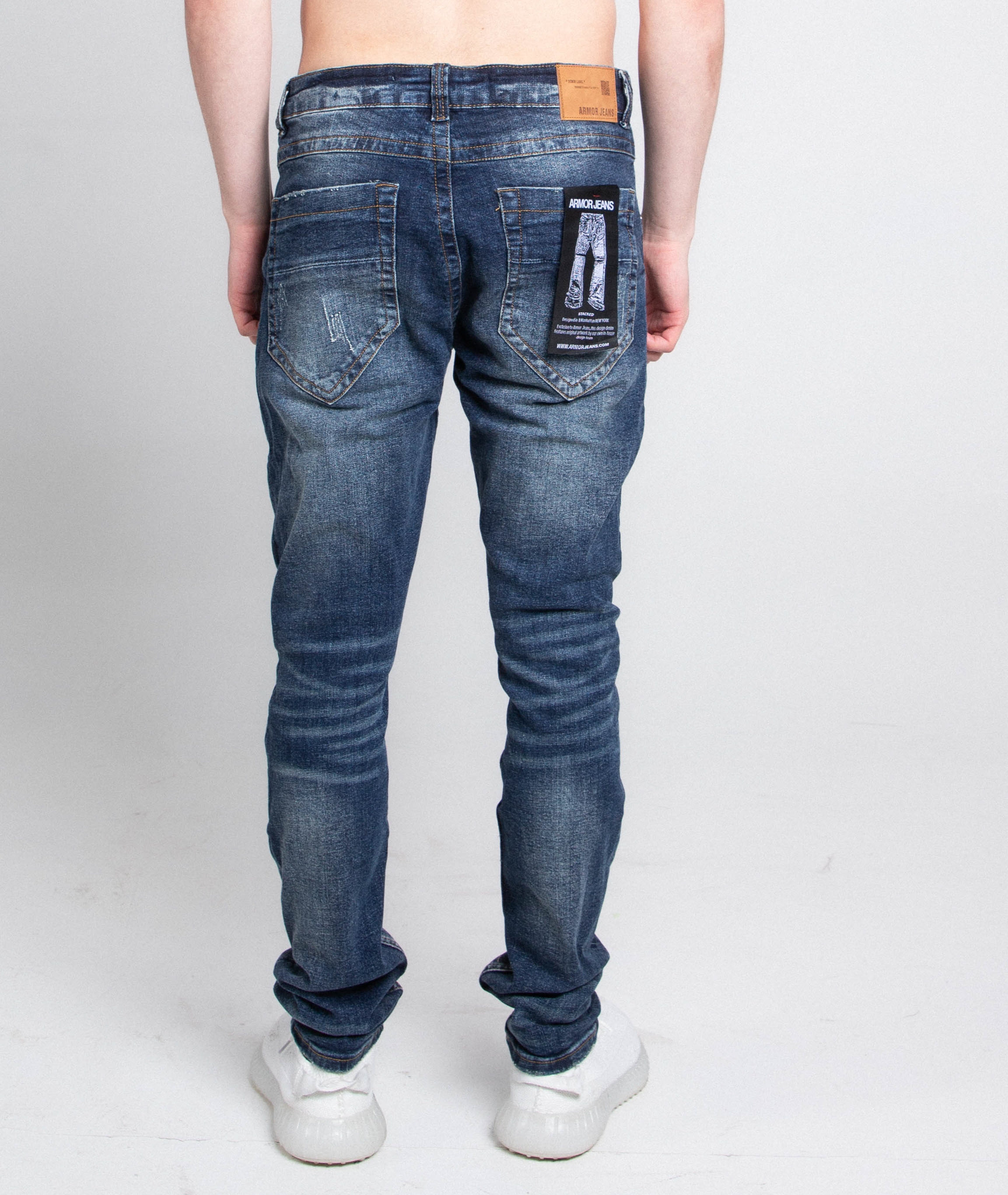 A403 SMALL RIPPED MID-RISE SKINNY JEANS