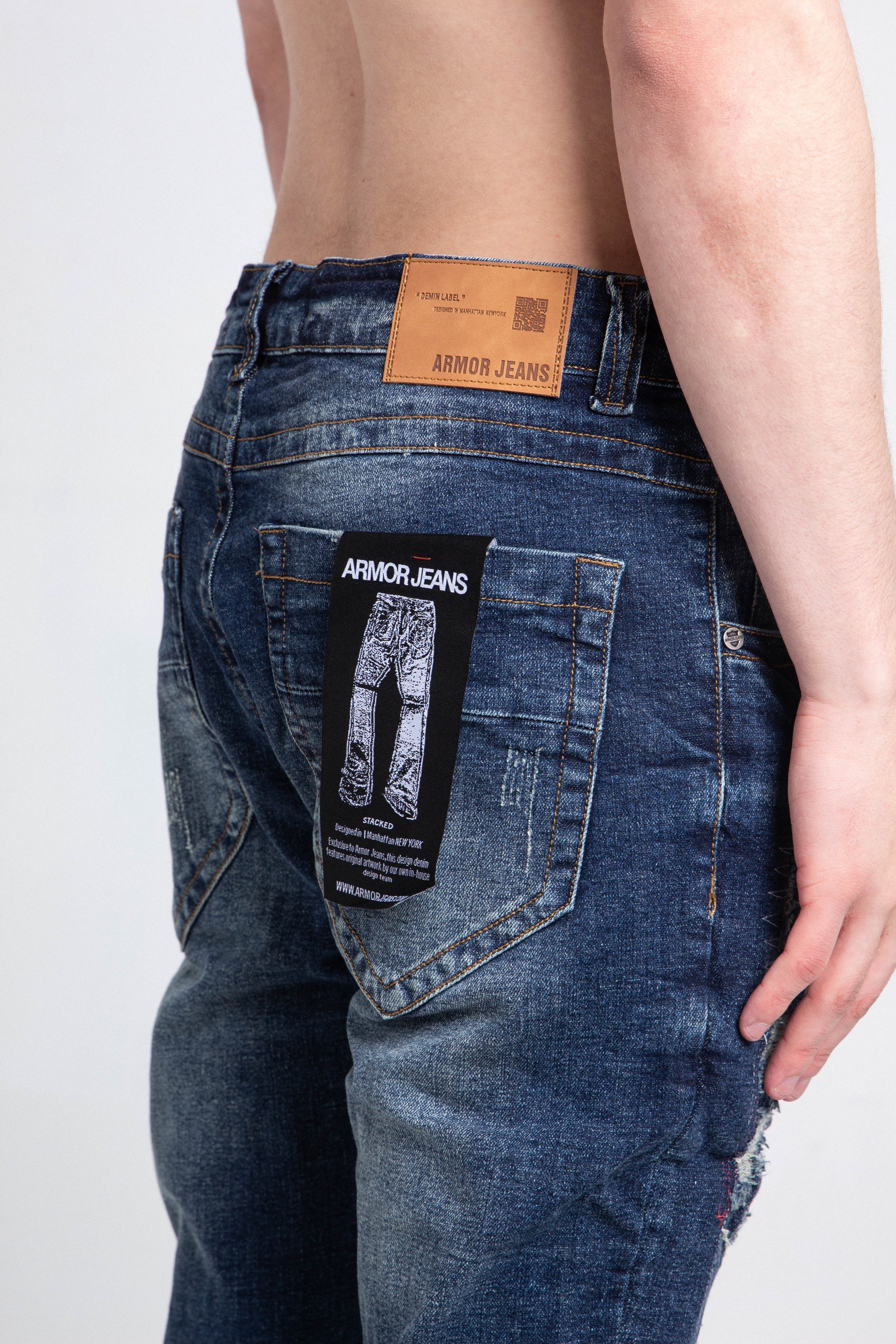 A403 SMALL RIPPED MID-RISE SKINNY JEANS