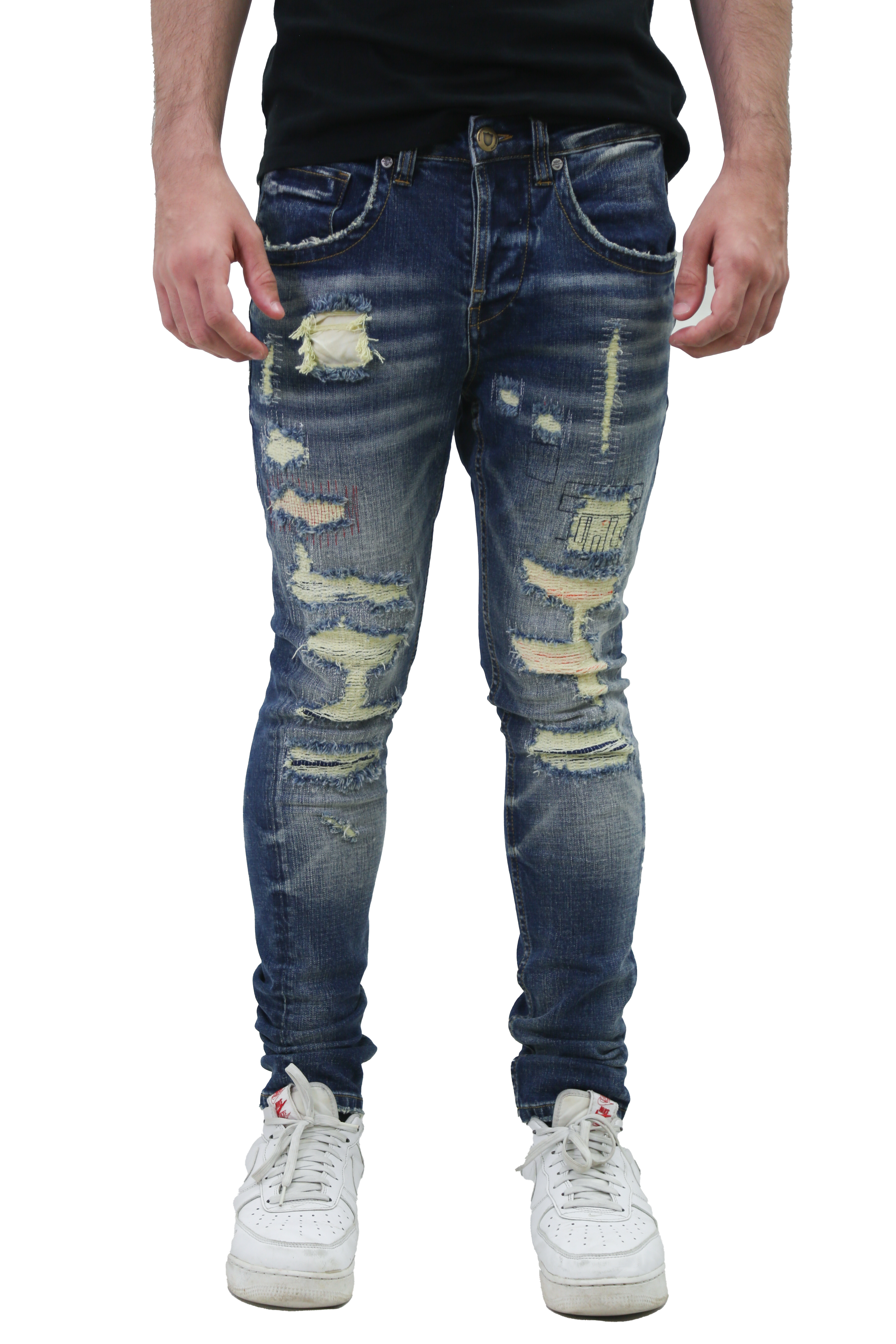 RIPPED MID-RISE SKINNY JEANS