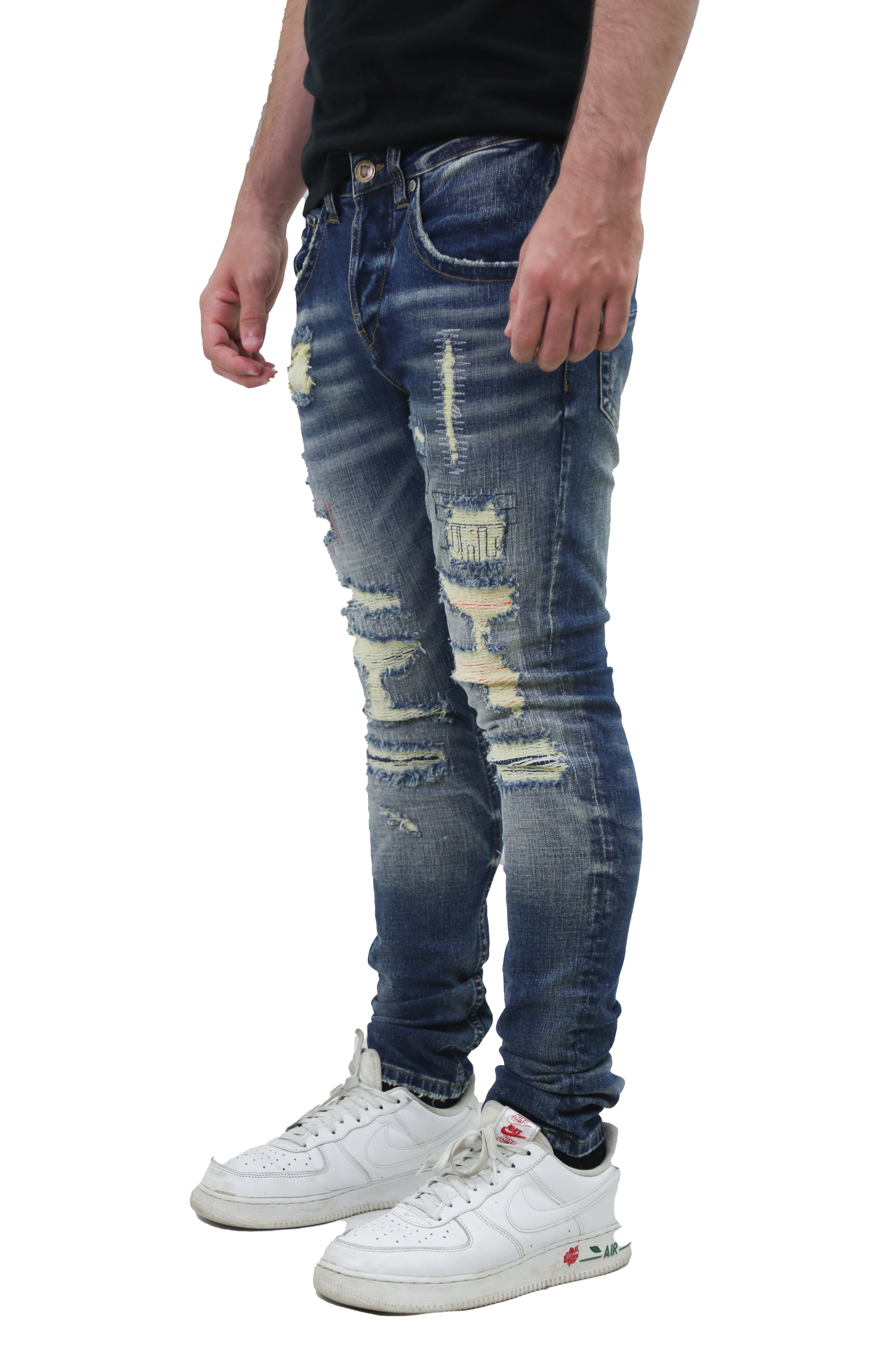 RIPPED MID-RISE SKINNY JEANS