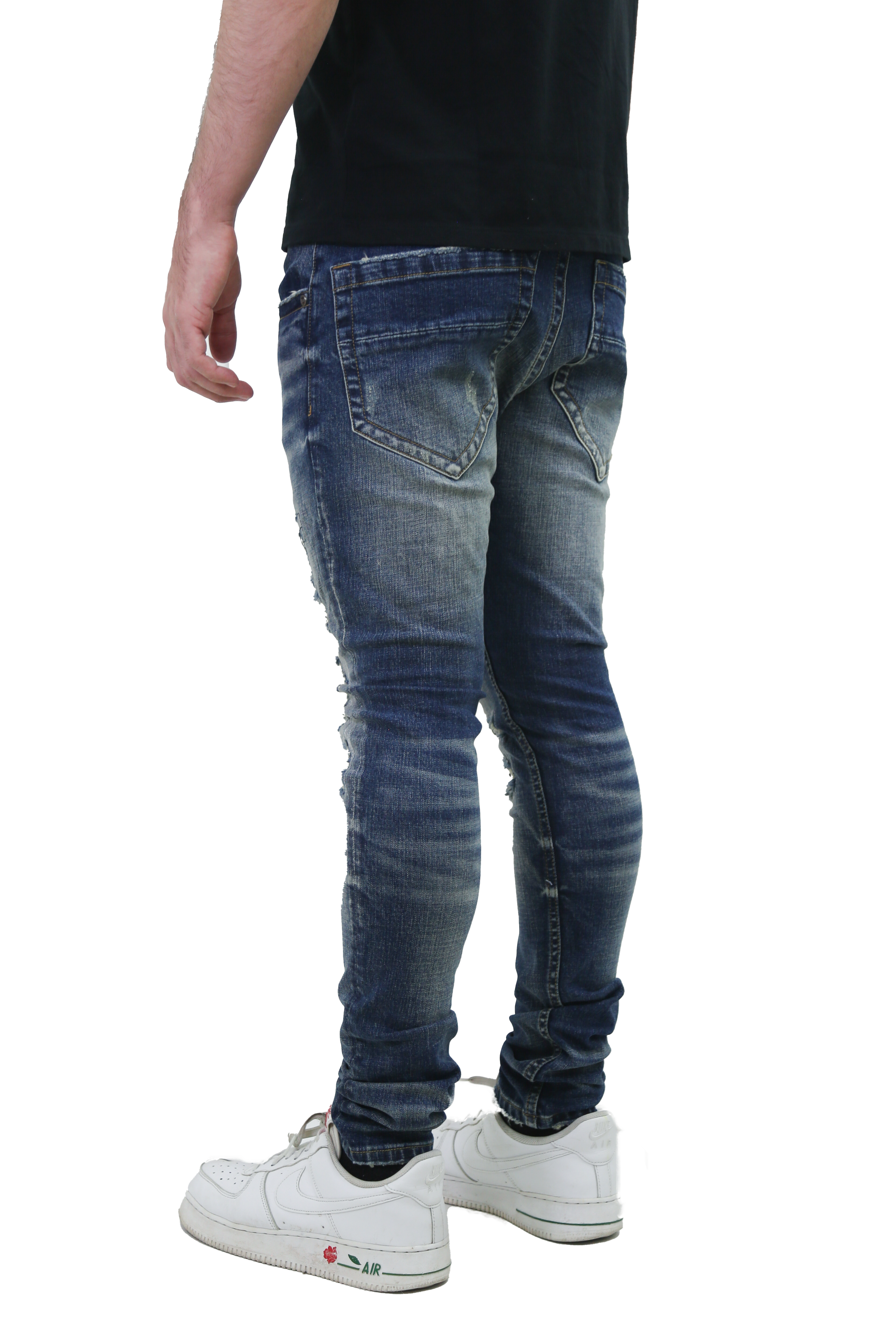 RIPPED MID-RISE SKINNY JEANS